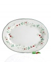 Serve up your best Christmas roast yet on this elegant platter featuring the timeless Winterberry pattern from Pfaltzgraff's holiday collection of dinnerware and dishes. Raised, hand-painted holly leaves and bright red berries dance along the scalloped sides.
