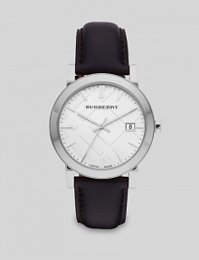 Handsome design of stainless steel with a leather bracelet is crafted with precision quartz movement.Round bezelQuartz movementWater resistant to 5ATMSecond handDate function at 3 o'clockStainless steel case: 38mm(1.49)Leather strapMade in Switzerland Handsome design of stainless steel with a leather bracelet is crafted with precision quartz movement.Round bezelQuartz movementWater resistant to 5ATMSecond handDate function at 3 o'clockStainless steel case: 38mm(1.49)Leather strapMade in Switzerland