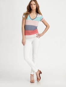 Soft v-neck with a plethora of spray paint-like stripes. V-neckShort sleeves50% polyester/50% rayonMachine washMade in USAModel shown is 5'10 (177cm) wearing US size Small. Soft v-neck with a plethora of spray paint-like stripes. V-neckShort sleeves50% polyester/50% rayonMachine washMade in USAModel shown is 5'10 (177cm) wearing US size Small.