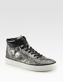 A sleek high-top style of coated leather exudes downtown-cool.Leather upperLeather liningPadded insoleRubber soleImported
