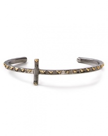 Gold-plated pyramid studs shine on this cool-girl cross cuff in gunmetal from House of Harlow 1960. Gold-plated pyramid studs shine on this cool-girl cross cuff in gunmetal from House of Harlow 1960.