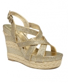 The season's new must-have wedge is here! The Jeanelle by GUESS is a beautiful combination of looks: earthy espadrille and glam glitter.