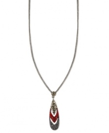 Make a colorful statement. Givenchy's necklace is crafted from hematite-tone mixed metal with a sparkling pendant of black-, red- and gold-colored crystals for a truly dazzling touch. Approximate length: 16 inches + 2-inch extender. Make a colorful statement. Givenchy's necklace is crafted from hematite-tone mixed metal with a sparkling pendant of black-, red- and gold-colored crystals for a truly dazzling touch. Approximate length: 16 inches + 2-inch extender.