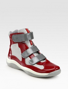 The essence of modern design, shaped in a mix of sleek patent leather and comfortable nylon with Velcro® flaps for easy off and on. Velcro closuresPadded insoleRubber soleImported