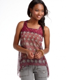A basket weave design at the neckline adds cool structure to a flowy, feather print top from Fire! A basket weave design at the neckline adds cool structure to a flowy, feather print top from Fire!