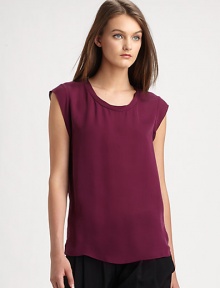 Chicer version of the cool-girl basic, this featherweight muscle tee is renewed by a pure silk silhouette that hits below the hips. RoundneckCap sleevesLonger length hits below the hipsSilkDry cleanImportedModel shown is 5'10 (177cm) wearing US size 2. Chicer version of the cool-girl basic, this featherweight muscle tee is renewed by a pure silk silhouette that hits below the hips. RoundneckCap sleevesLonger length hits below the hipsSilkDry cleanImportedModel shown is 5'10 (177cm) wearing US size 2.