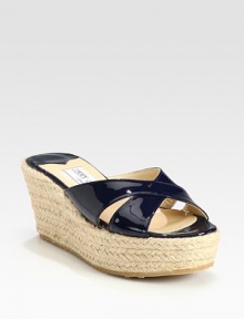 Simple slip-on design in shiny patent leather on textured rope wedge are must-haves this season. Wedge heel, 3 (75mm) Platform, 1½ (40mm) Compares to a 1½ heel (40mm) Open toe Crisscross strap Leather lining Rubber sole Made in ItalyOUR FIT MODEL RECOMMENDS ordering true whole size; ½ sizes should order the next whole size up.