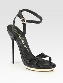 A sky-high stiletto heel and lacquered platform elevate this strappy favorite in lizard-print leather. Self-covered heel, 5¼ (130mm)Lacquered island platform, ½ (15mm)Compares to a 4¾ heel (120mm)Lizard-print leather upperAdjustable ankle strapLeather lining and solePadded insoleImported A sky-high stiletto heel and lacquered platform elevate this strappy favorite in lizard-print leather. Self-covered heel, 5¼ (130mm)Lacquered island platform, ½ (15mm)Compares to a 4¾ heel (120mm)Lizard-print leather upperAdjustable ankle strapLeather lining and solePadded insoleImported