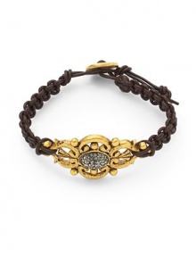 THE LOOKClassic collectionOrnate oval detailBlack Swarovski crystal and hematite accents18k goldplated and rhodium-plated settingBraided leatherToggle closureTHE MEASUREMENTAccent width, about 1Length, about 8.5ORIGINMade in USA THE LOOKClassic collectionOrnate oval detailBlack Swarovski crystal and hematite accents18k goldplated and rhodium-plated settingBraided leatherToggle closureTHE MEASUREMENTAccent width, about 1Length, about 8.5ORIGINMade in USA