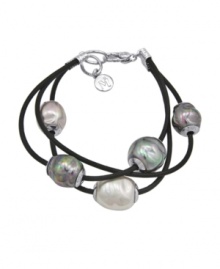 When modest tradition and modern edge combine. This chic, new style by Majorica features three rows of black leather cord strung with multicolored, organic, man-made pearls (12 mm). Setting and clasp crafted in sterling silver. Approximate length: 7-1/2 inches. When modest tradition and modern edge combine. This chic, new style by Majorica features three rows of black leather cord strung with multicolored, organic, man-made pearls (12 mm). Setting and clasp crafted in sterling silver. Approximate length: 7-1/2 inches.