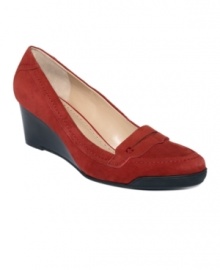 Adrienne Vittadini's Tamar wedges elevate the traditional penny loafer to new fashion heights! With a stacked wedge heel silhouette, they're available in a choice of leather, patent leather and suede styles. Adrienne Vittadini's Tamar wedges elevate the traditional penny loafer to new fashion heights! With a stacked wedge heel silhouette, they're available in a choice of leather, patent leather and suede styles.