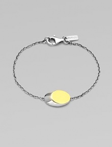 From the Eclipse Collection. A modern update of the classic ID bracelet, offering a slanted oval disk on a graceful chain.Sterling silverGoldplatedLength, about 7Disc length, about ¾Lobster claspImported From the Eclipse Collection. A modern update of the classic ID bracelet, offering a slanted oval disk on a graceful chain.Sterling silverGoldplatedLength, about 7Disc length, about ¾Lobster claspImported