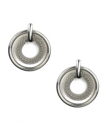 Simplicity and refinement in a simple stud setting. AK Anne Klein earrings feature two stacked circles in smooth and woven silver tone mixed metal. Approximate diameter: 1 inch. Simplicity and refinement in a simple stud setting. AK Anne Klein earrings feature two stacked circles in smooth and woven silver tone mixed metal. Approximate diameter: 1 inch.
