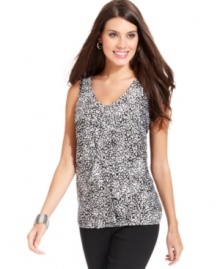 Alfani's petite top features a bold print and a femme ruffle at the center front. Easy to wear over black trousers or tucked into a pencil skirt! Alfani's petite top features a bold print and a femme ruffle at the center front. Easy to wear over black trousers or tucked into a pencil skirt!