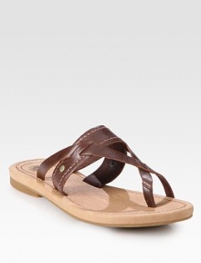 Burnished leather straps form an unexpected toe ring while a rubber sole provides traction. Leather upperLeather liningRubber solePadded insoleImportedOUR FIT MODEL RECOMMENDS ordering true whole size; ½ sizes should order the next whole size down. Burnished leather straps form an unexpected toe ring while a rubber sole provides traction. Leather upperLeather liningRubber solePadded insoleImportedOUR FIT MODEL RECOMMENDS ordering true whole size; ½ sizes should order the next whole size down.