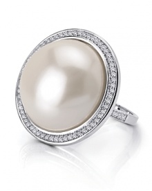 Take your jewel box in a classic direction with Crislu's pearl and cubic zirconia cocktail ring. Channel ladylike decadence, this bauble loves red lips and a dramatic gown. Take your jewel box in a classic direction with Crislu's pearl and cubic zirconia cocktail ring. Channel ladylike decadence, this bauble loves red lips and a dramatic gown.