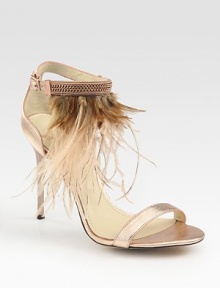 Shimmering metallic leather straps embellished by an array of exotic feathers. Self-covered heel, 4 (100mm)Metallic leather and feather upperAdjustable ankle strapLeather lining and solePadded insoleMade in ItalyOUR FIT MODEL RECOMMENDS ordering true size. Shimmering metallic leather straps embellished by an array of exotic feathers. Self-covered heel, 4 (100mm)Metallic leather and feather upperAdjustable ankle strapLeather lining and solePadded insoleMade in ItalyOUR FIT MODEL RECOMMENDS ordering true size.