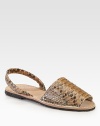 Pair this exotic python slingback with a tailored dress or breezy jumpsuit for a runway-worthy look that will turn heads. Python upperLeather lining and soleImported