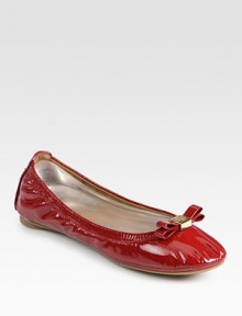 High-gloss patent leather flat has a stretchy upper and logoed bow adornment. Patent leather upperLeather liningRubber solePadded insoleImportedOUR FIT MODEL RECOMMENDS ordering true size. High-gloss patent leather flat has a stretchy upper and logoed bow adornment. Patent leather upperLeather liningRubber solePadded insoleImportedOUR FIT MODEL RECOMMENDS ordering true size.