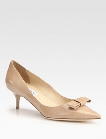 On-trend point toe silhouette in the finest Italian patent leather with a simple bow adornment. Lacquered heel, 2¼ (60mm)Patent leather upperPoint toeLeather lining and solePadded insoleMade in Italy On-trend point toe silhouette in the finest Italian patent leather with a simple bow adornment. Lacquered heel, 2¼ (60mm)Patent leather upperPoint toeLeather lining and solePadded insoleMade in Italy