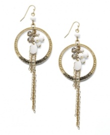 Inspired by the intricate design of a dream catcher, INC International Concepts' bohemian drop earrings feature pave-cut circles decorated with white plastic and black glass beads. Set in gold-plated mixed metal. Approximate drop: 4-1/2 inches. Inspired by the intricate design of a dream catcher, INC International Concepts' bohemian drop earrings feature pave-cut circles decorated with white plastic and black glass beads. Set in gold-plated mixed metal. Approximate drop: 4-1/2 inches.