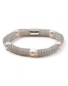 Make a bubbly statement with this sterling silver and pearl bracelet from Links of London. A cool option come party time, this bauble lends a shot of sparkle to your favorite cocktail mini. Make a bubbly statement with this sterling silver and pearl bracelet from Links of London. A cool option come party time, this bauble lends a shot of sparkle to your favorite cocktail mini.