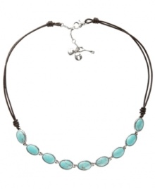 For the free-spirited fashionista, Fossil's trendy station necklace combines oval-shaped reconstituted turquoise stones set in vintage silver tone mixed metal and strung from a chocolate leather cord. Features a lobster claw closure. Approximate length: 17 inches + 2-inch extender. For the free-spirited fashionista, Fossil's trendy station necklace combines oval-shaped reconstituted turquoise stones set in vintage silver tone mixed metal and strung from a chocolate leather cord. Features a lobster claw closure. Approximate length: 17 inches + 2-inch extender.