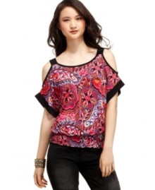 Brighten up your day ensemble with this cutout top from BCX featured in a brilliant, printed fabric! Brighten up your day ensemble with this cutout top from BCX featured in a brilliant, printed fabric!