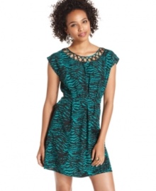 A neckline of cutouts accents this zebra-print dress with trend-right style! For a look that's chic by day, pair the a-line frock with sandals and your prettiest accessories! A neckline of cutouts accents this zebra-print dress with trend-right style! For a look that's chic by day, pair the a-line frock with sandals and your prettiest accessories!