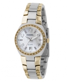 A gem of a watch, from Fossil. With a beautiful two-tone design highlighted by crystal accents, this women's watch features a stainless steel silvertone bracelet with goldtone accent. Round stainless steel silvertone case and Swarovski crystal-accented bezel. Mother-of-pearl dial with logo, date window, numerical and crystal accent indices. Quartz movement. Water resistant to 100 meters. 11-year limited warranty. A gem of a watch, from Fossil. With a beautiful two-tone design highlighted by crystal accents, this women's watch features a stainless steel silvertone bracelet with goldtone accent. Round stainless steel silvertone case and Swarovski crystal-accented bezel. Mother-of-pearl dial with logo, date window, numerical and crystal accent indices. Quartz movement. Water resistant to 100 meters. 11-year limited warranty.