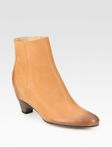 Distressed leather staple defined by a hidden wedge and stacked kitten heel. Stacked heel, 1 (25mm)Leather upperSide zipperLeather lining and solePadded insoleMade in ItalyOUR FIT MODEL RECOMMENDS ordering one half size up as this style runs small. Distressed leather staple defined by a hidden wedge and stacked kitten heel. Stacked heel, 1 (25mm)Leather upperSide zipperLeather lining and solePadded insoleMade in ItalyOUR FIT MODEL RECOMMENDS ordering one half size up as this style runs small.