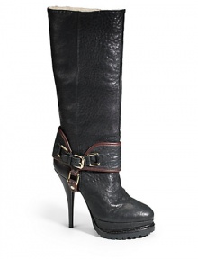 THE LOOKOval toeEquestrian-inspired wrap-around buckle detailPull-on styleShearling-lined shaftLug soleStacked heel 5 (125mm)Self-covered and lug sole platform, 1¼ (30mm)Compares to a 3¾ heel (95mm)Shaft 13Circumference 15THE MATERIALLeather upperLeather and shearling lining Leather and lug sole ORIGINImportedFur origin: Brazil THE LOOKOval toeEquestrian-inspired wrap-around buckle detailPull-on styleShearling-lined shaftLug soleStacked heel 5 (125mm)Self-covered and lug sole platform, 1¼ (30mm)Compares to a 3¾ heel (95mm)Shaft 13Circumference 15THE MATERIALLeather upperLeather and shearling lining Leather and lug sole ORIGINImportedFur origin: Brazil