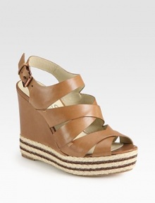 Wide leather slingback with cross-cross straps join a chain-embellished espadrille wedge. Leather, hemp and chain-covered wedge, 5 (125mm)Hemp and chain-covered platform, 2 (50mm)Compares to a 3 heel (75mm)Leather upperAdjustable ankle strapLeather liningBuffed leather solePadded insoleImported Wide leather slingback with cross-cross straps join a chain-embellished espadrille wedge. Leather, hemp and chain-covered wedge, 5 (125mm)Hemp and chain-covered platform, 2 (50mm)Compares to a 3 heel (75mm)Leather upperAdjustable ankle strapLeather liningBuffed leather solePadded insoleImported