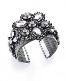 Crystal chic. Perfect your look in Bar III's fabulous flower cuff -- an elaborate mix of wrapped wire, floral design, and sparkling crystal accents. Crafted in mixed metal. Approximate diameter: 2-1/4 inches. Crystal chic. Perfect your look in Bar III's fabulous flower cuff -- an elaborate mix of wrapped wire, floral design, and sparkling crystal accents. Crafted in mixed metal. Approximate diameter: 2-1/4 inches.