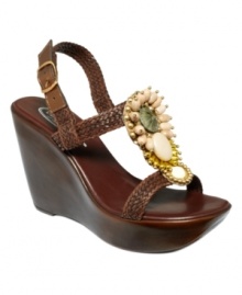 Beaded embellishments are hot this season. One look at the detail on the Caliente wedge sandals by Callisto and you'll see why. Beaded embellishments are hot this season. One look at the detail on the Caliente wedge sandals by Callisto and you'll see why.