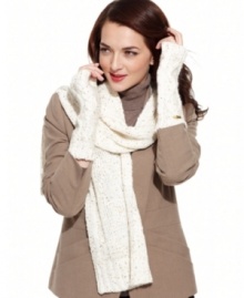 Simply chic, these plush cable knit arm warmers from Calvin Klein feature a fingerless design that makes texting a breeze when you're out and about in chilly weather. Simply chic, these plush cable knit arm warmers from Calvin Klein feature a fingerless design that makes texting a breeze when you're out and about in chilly weather.