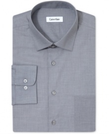 Get a firm handle on solid office-style and comfort with this dress shirt from Calvin Klein. Get a firm handle on solid office-style and comfort with this dress shirt from Calvin Klein.