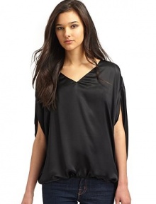 THE LOOKV necklineShort batwing sleevesBubble hem with adjustable side tiePull-on styleTHE FITAbout 27 from shoulder to hemTHE MATERIALSilkCARE & ORIGINDry cleanImportedModel shown is 5'10 (177cm) wearing US size 4. THE LOOKV necklineShort batwing sleevesBubble hem with adjustable side tiePull-on styleTHE FITAbout 27 from shoulder to hemTHE MATERIALSilkCARE & ORIGINDry cleanImportedModel shown is 5'10 (177cm) wearing US size 4.