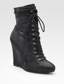 Soft leather look has a showstopping wedge and lace-up front. Self-covered heel, 4½ (115mm) Covered platform, ½ (15mm) Compares to a 4 heel (100mm) Leather upper Leather lining Wooden sole Padded insole Imported Soft leather look has a showstopping wedge and lace-up front. Self-covered heel, 4½ (115mm) Covered platform, ½ (15mm) Compares to a 4 heel (100mm) Leather upper Leather lining Wooden sole Padded insole Imported