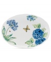 Now in bloom. The Butterfly Meadow Blue oval platter from Lenox features the sturdy, scalloped porcelain of original Butterfly Meadow dinnerware but with oversized hydrangeas and other dreamy blossoms in shades of blue.