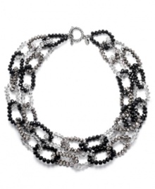 Neutral territory. With its practical black and gray palette, c.A.K.e. by Ali Khan's double necklace will mix and match effortlessly within your wardrobe. Adorned with faceted glass rondelle accents, it's made in silver tone mixed metal and includes a toggle closure. Approximate length: 18 inches. Neutral territory. With its practical black and gray palette, c.A.K.e. by Ali Khan's double necklace will mix and match effortlessly within your wardrobe. Adorned with faceted glass rondelle accents, it's made in silver tone mixed metal and includes a toggle closure. Approximate length: 18 inches.