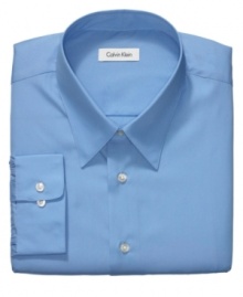 Offering plenty of versatility for the workweek, this smooth Calvin Klein dress shirt provides a solid foundation for any look. Offering plenty of versatility for the workweek, this smooth Calvin Klein dress shirt provides a solid foundation for any look.