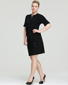 Master utilitarian city-chic in this Calvin Klein Plus shirt dress. A pared-down silhouette sets the framework for smart, strong dressing, whether you're headed to cocktails or the corner office. Master utilitarian city-chic in this Calvin Klein Plus shirt dress. A pared-down silhouette sets the framework for smart, strong dressing, whether you're headed to cocktails or the corner office.