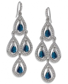 Channel romantic style in sparkling chandeliers. Carolee earrings feature a dramatic cut-out pear design accented by glittering blue glass stones. Crafted in silver tone imitation rhodium mixed metal. Approximate drop: 2-3/4 inches. Channel romantic style in sparkling chandeliers. Carolee earrings feature a dramatic cut-out pear design accented by glittering blue glass stones. Crafted in silver tone imitation rhodium mixed metal. Approximate drop: 2-3/4 inches.