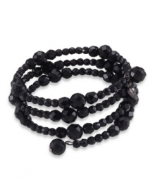 Let this sleek black bracelet coil around your wrist like a snake. Crafted by Carolee, this three row stretch bracelet features faceted jet beads set in hematite-plated mixed metal. Approximate diameter: 2-1/4 inches. Let this sleek black bracelet coil around your wrist like a snake. Crafted by Carolee, this three row stretch bracelet features faceted jet beads set in hematite-plated mixed metal. Approximate diameter: 2-1/4 inches.