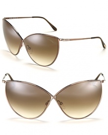 New from Tom Ford! Sleek criss-cross sunglasses in a modern cat eye silhouette. New from Tom Ford! Sleek criss-cross sunglasses in a modern cat eye silhouette.