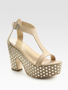 Polka-dotted leather silhouette with a sculpted heel, chunky platform and an adjustable ankle strap. Self-covered heel, 4½ (115mm)Island platform, 2 (50mm)Compares to a 2½ heel (65mm)Leather upperLeather lining and solePadded insoleImportedOUR FIT MODEL RECOMMENDS ordering true size. Polka-dotted leather silhouette with a sculpted heel, chunky platform and an adjustable ankle strap. Self-covered heel, 4½ (115mm)Island platform, 2 (50mm)Compares to a 2½ heel (65mm)Leather upperLeather lining and solePadded insoleImportedOUR FIT MODEL RECOMMENDS ordering true size.