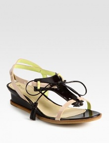 Lengthy tassel laces front playful patent leather straps, concluding with a slight self-covered wedge. Self-covered wedge, 1 (25mm)Patent leather upperLeather lining and solePadded insoleMade in ItalyOUR FIT MODEL RECOMMENDS ordering one half size up as this style runs small. Lengthy tassel laces front playful patent leather straps, concluding with a slight self-covered wedge. Self-covered wedge, 1 (25mm)Patent leather upperLeather lining and solePadded insoleMade in ItalyOUR FIT MODEL RECOMMENDS ordering one half size up as this style runs small.