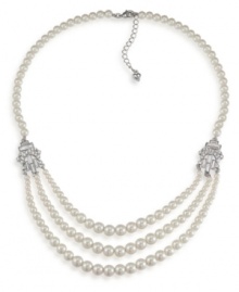 The classic elegance of pearls. Carolee's sophisticated three-row necklace features glass pearls accented by sparkling silver tone spacers with crystal accents. Set in imitation rhodium-plated mixed metal. Approximate length 20 inches + 2-inch extender. The classic elegance of pearls. Carolee's sophisticated three-row necklace features glass pearls accented by sparkling silver tone spacers with crystal accents. Set in imitation rhodium-plated mixed metal. Approximate length 20 inches + 2-inch extender.