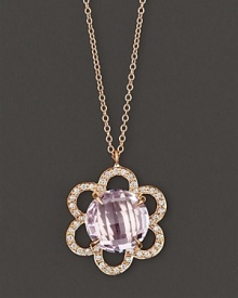 Pavé diamonds blossom around a 18K gold flower, centered with faceted rose of France. By Carelle. Pavé diamonds blossom around a 18K gold flower, centered with faceted rose of France. By Carelle.